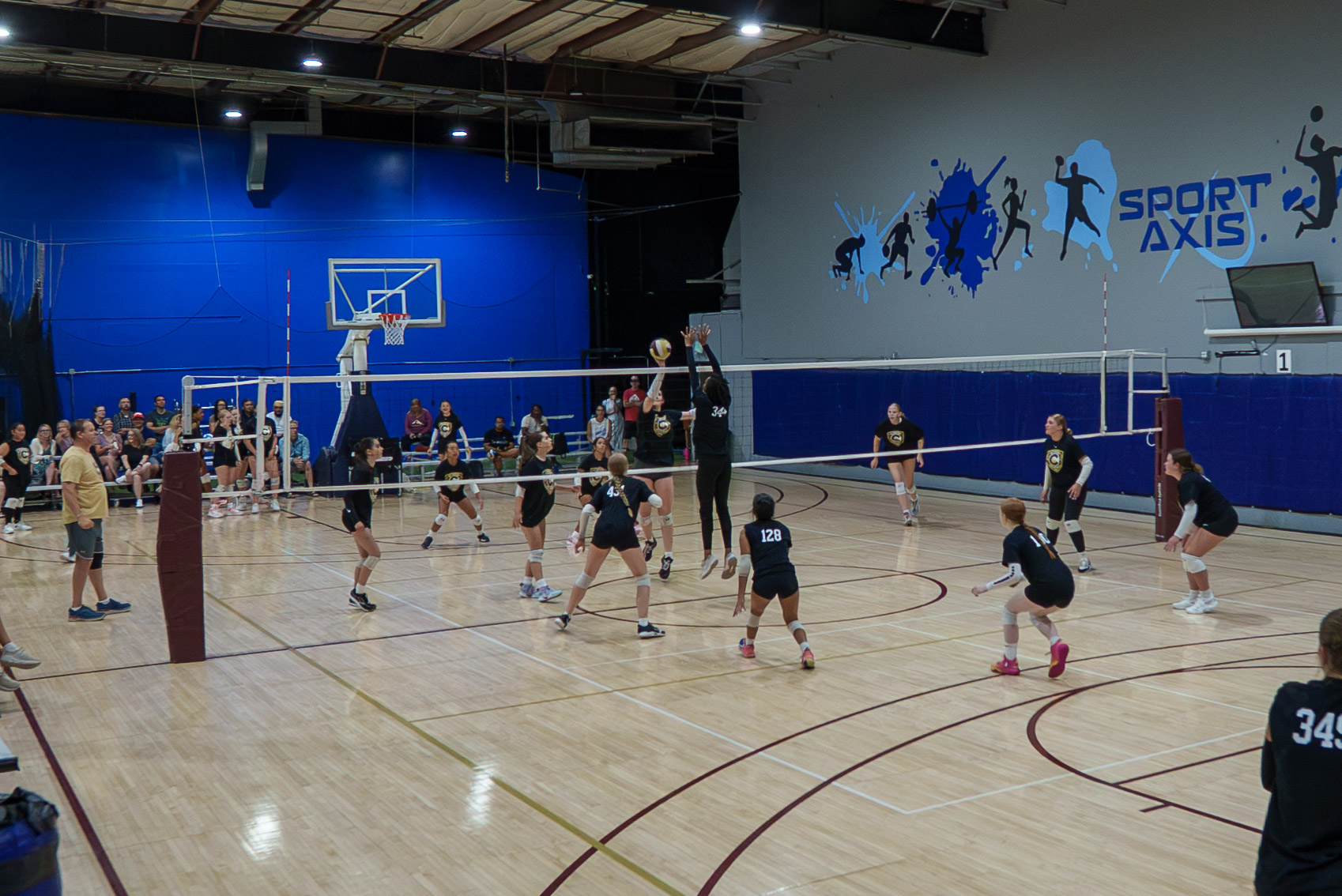 A VC Denver volleyball match in progress at the Sport Axis facility